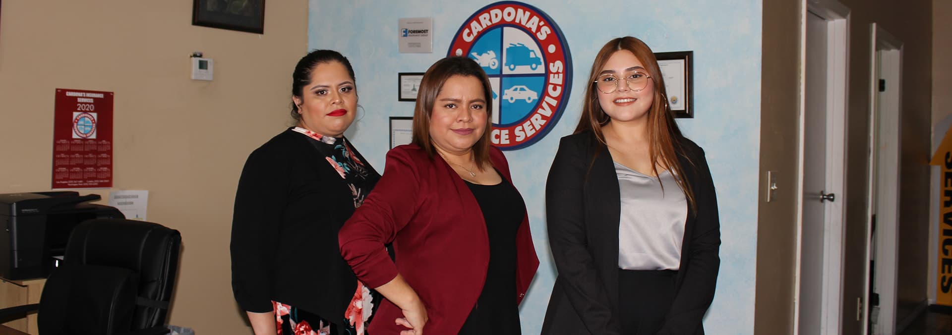 Cardona's Insurance team inside a local office