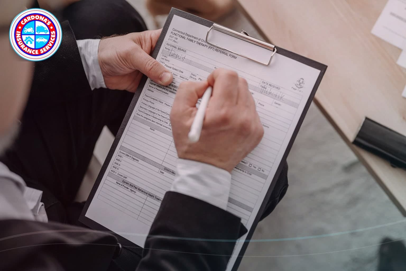 Insurance card and DMV registration notice prepared for review